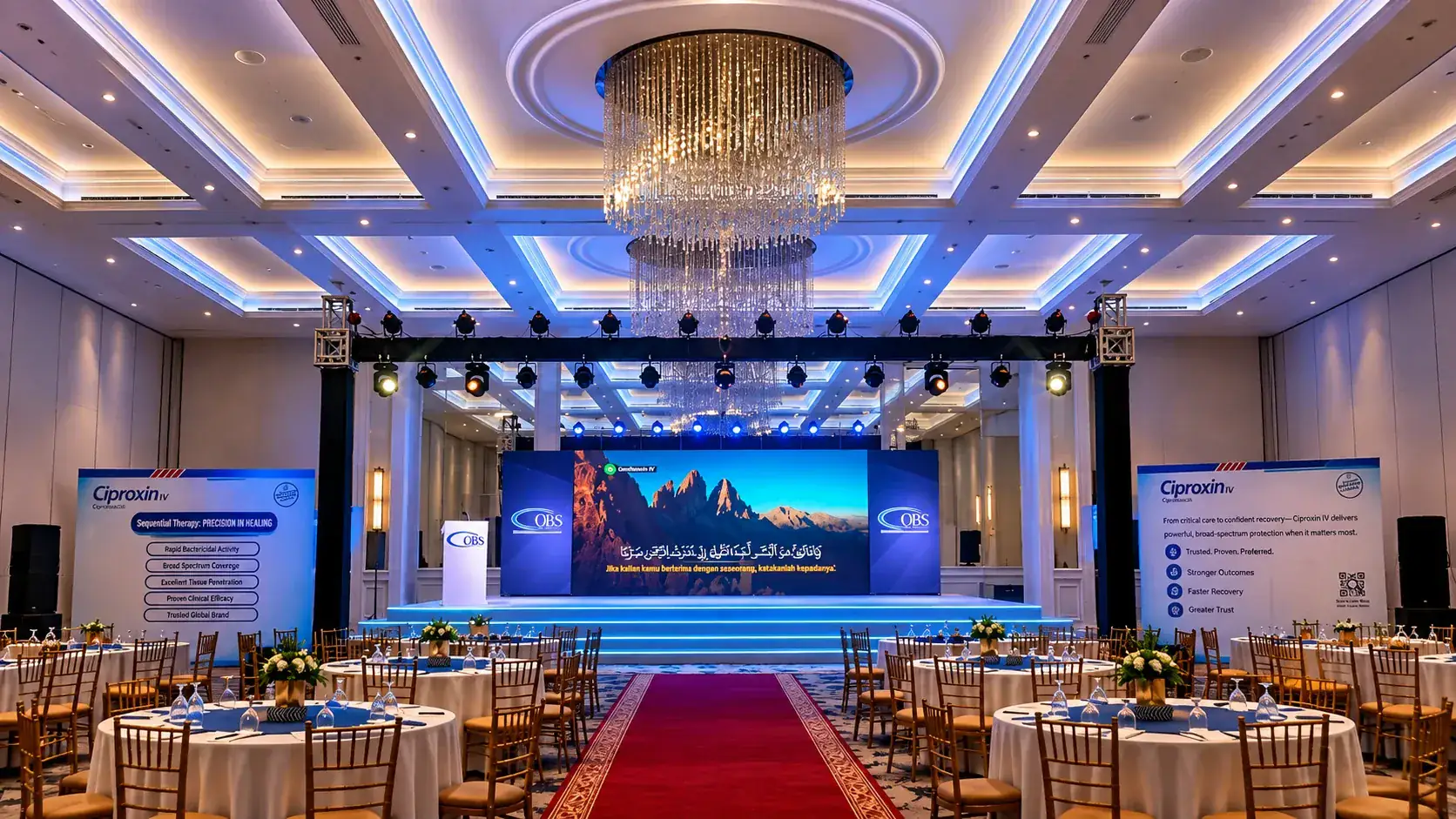 Same ballroom fully produced for a corporate product launch, with stage, lighting and table settings