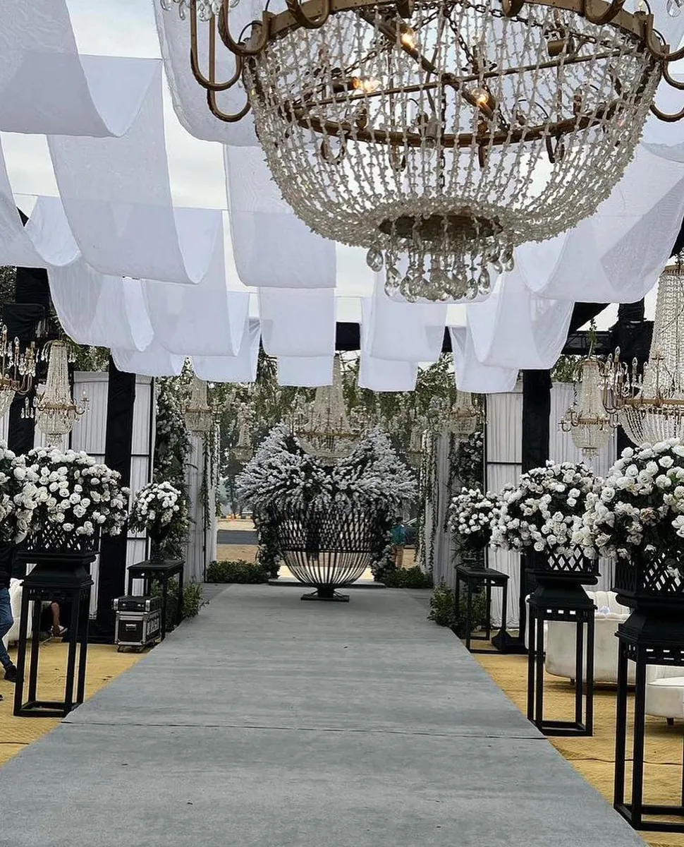 Real walima reception stage and décor produced by Baraka Events in Lahore, the kind of full production a wedding budget actually pays for